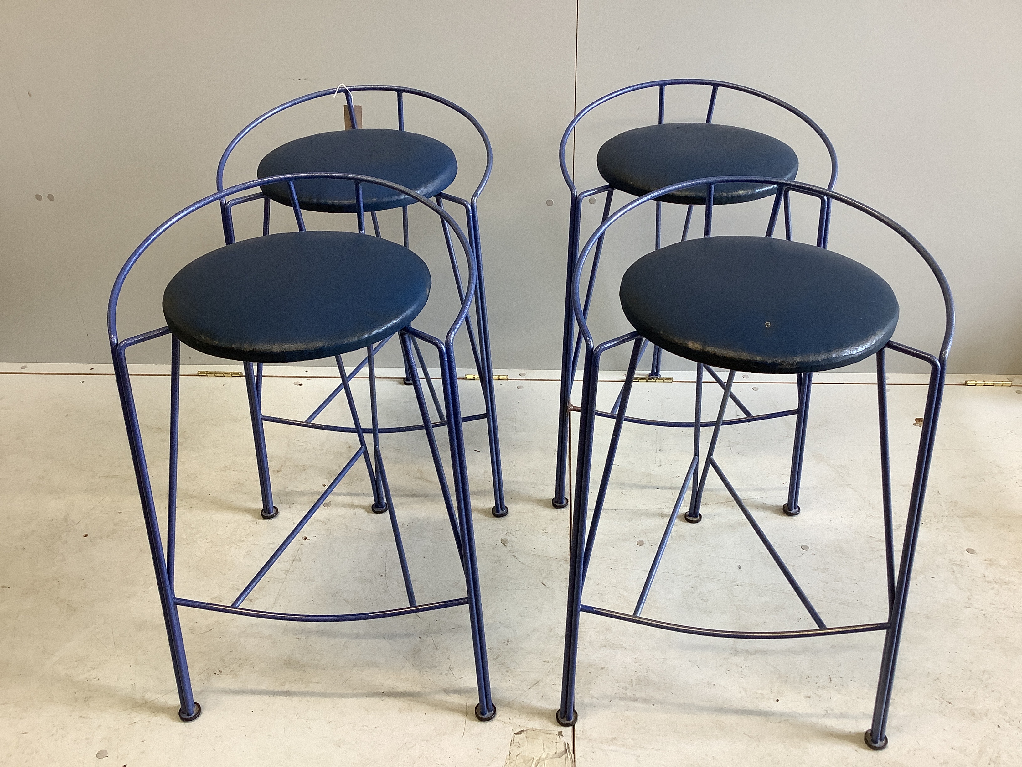 A set of four mid century metal kitchen stools, width 49cm, height 73cm